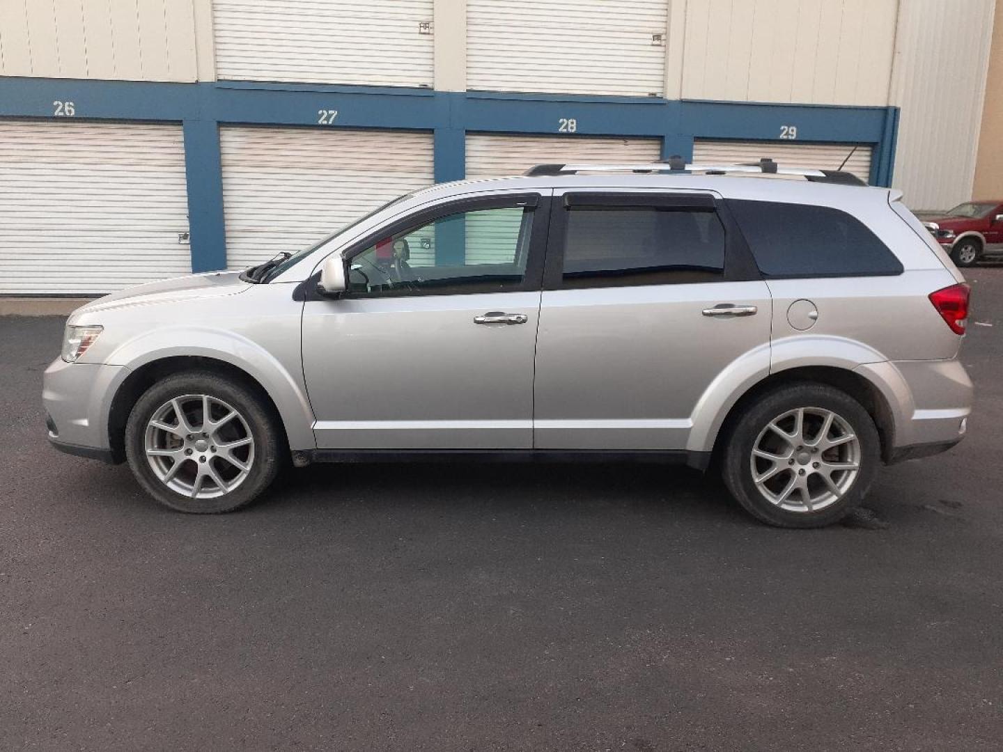 2013 Dodge Journey (3C4PDDFGXDT) with an 3.6L V6 DOHC 24V engine, 6-Speed Automatic transmission, located at 2015 Cambell Street, Rapid City, SD, 57701, (605) 342-8326, 44.066433, -103.191772 - CARFAX AVAILABLE - Photo#0